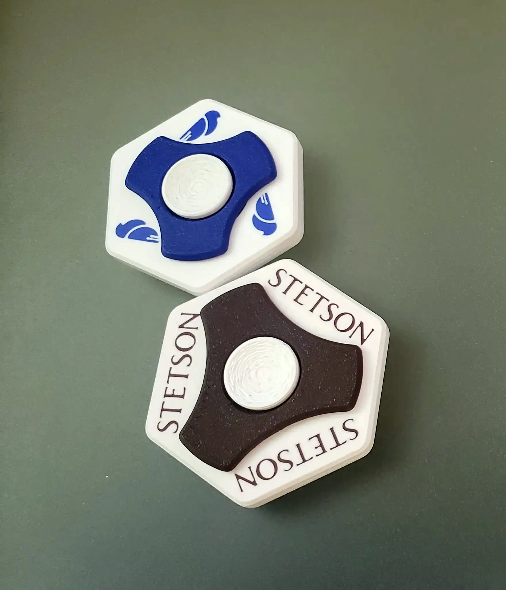 Branded Concentric Coin Spinners with custom logos and colors
